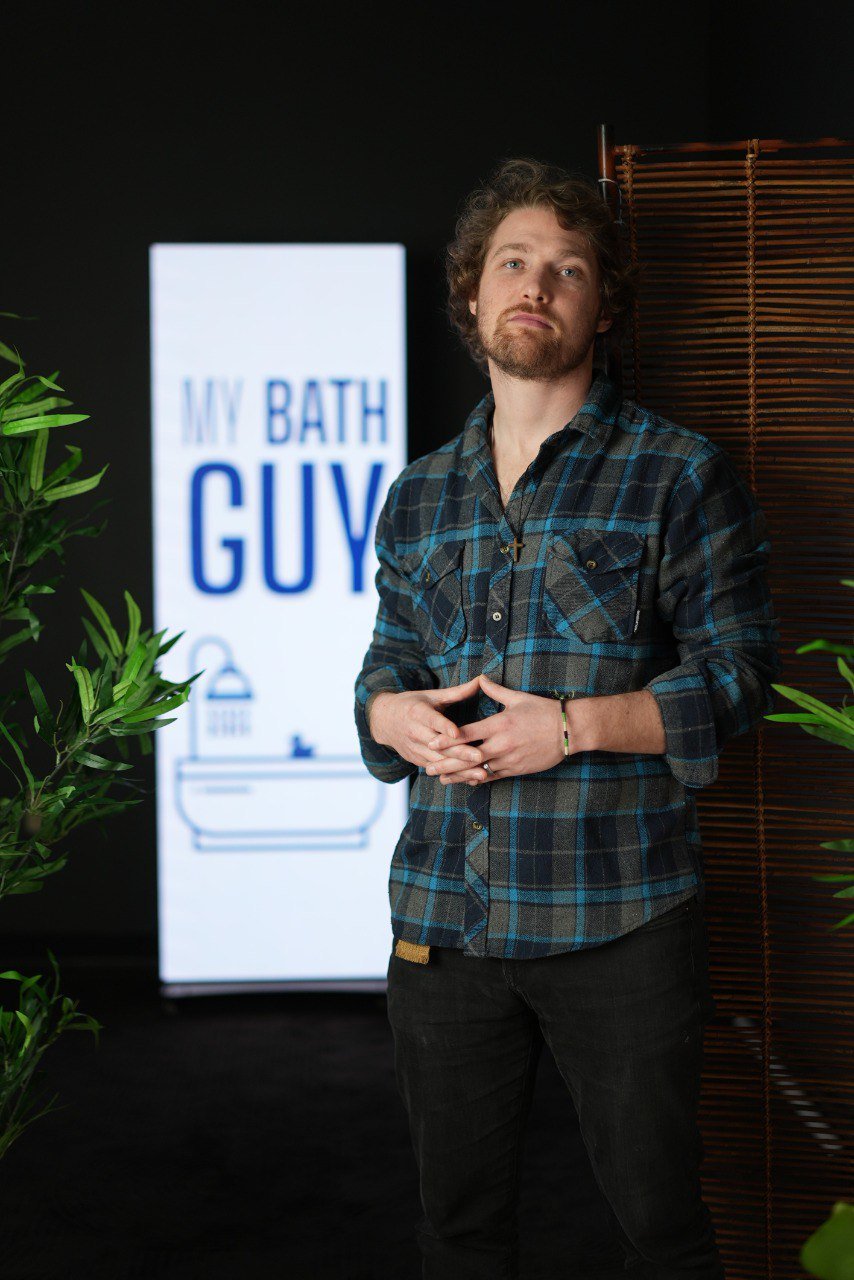 LED Poster with custom branding behind subject